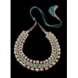 An Indian moulded glass and diamond necklace