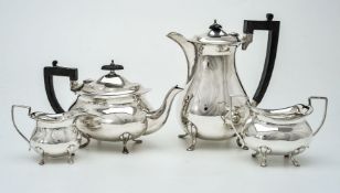A matched silver oblong baluster four piece tea service