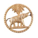 A first half of the 20th century gold coloured elephant and palm brooch