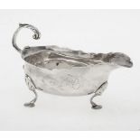 A George III English provincial small oval sauce boat by James Crawford