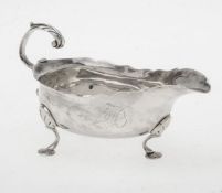 A George III English provincial small oval sauce boat by James Crawford