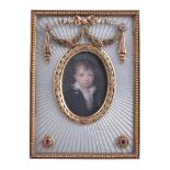 A Continental gold coloured, enamel and gem set miniature frame