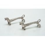 A pair of Edwardian silver novelty knife rests by Andrew Barrett & Sons