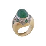 An emerald and diamond dress ring