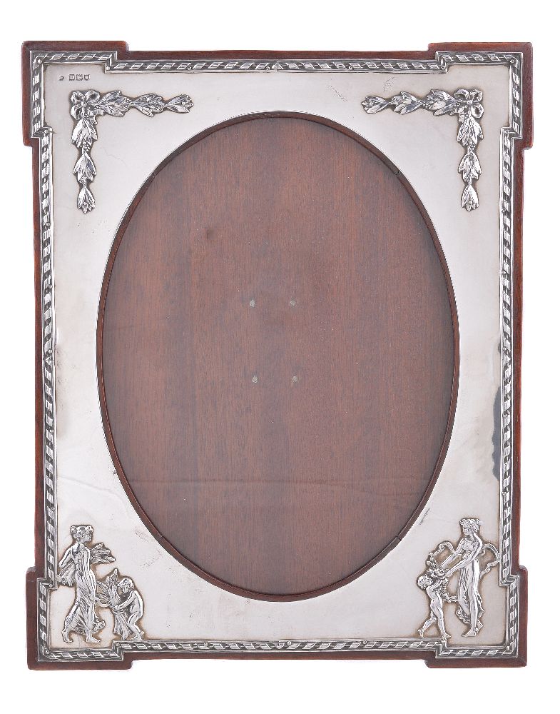 An Edwardian silver photograph frame by William Comyns & Sons