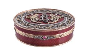 A Continental gold coloured, enamel and gem set oval box