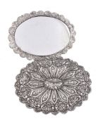 A pair of Ottoman Turkish silver shaped oval mirrors