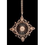 A pierced gold pendant on chain