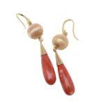 ϒ A pair of coral ear pendants