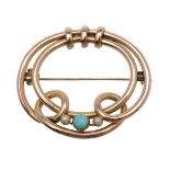 An early 20th century hooped turquoise and half pearl brooch