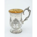 A Victorian silver pedestal christening mug by George Adams for Chawner & Co.