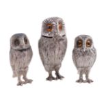 A silver novelty three piece owl cruet set by Richard Comyns