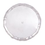 A silver shaped circular salver by The Goldsmiths & Silversmiths Co. Ltd