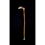 Lotus Arts de Vivre, a silver coloured cloven hoof staff