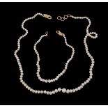 A natural pearl necklace and bracelet