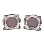 A matched pair of Art Nouveau silver photograph frames