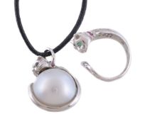 A South Sea cultured pearl, diamond, ruby and emerald cat pendant