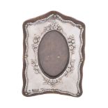 A silver small photograph frame by Boots Pure Drug Co.