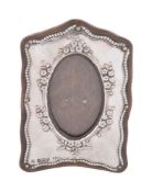 A silver small photograph frame by Boots Pure Drug Co.