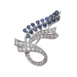 A sapphire and diamond spray brooch