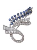 A sapphire and diamond spray brooch