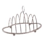 A silver navette shaped toastrack by J. A. Campbell