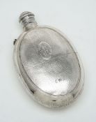 A Victorian silver rounded oval spirit flask by Alfred Taylor