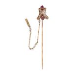 A ruby and seed pearl stick pin by Gerardo Sacco