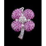 A ruby and diamond flower brooch/pendant