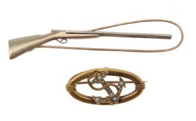 An early 20th century gold coloured and seed pearl anchor brooch