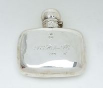 A late Victorian silver rounded rectangular small spirit flask by George Unite & Sons