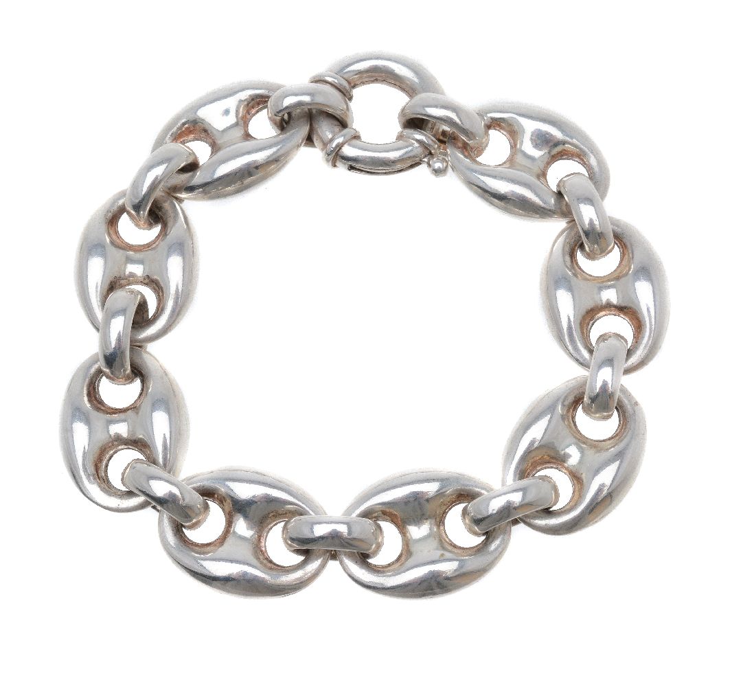 A silver bracelet, the polished links to a ring bolt clasp