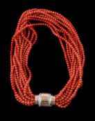 ϒ A multi strand coral bead necklace