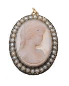 A hardstone cameo brooch, the oval cameo carved with the profile of a lady
