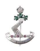 A diamond and ruby Royal Military College of Canada sweetheart brooch, the pavé set diamond gauntlet