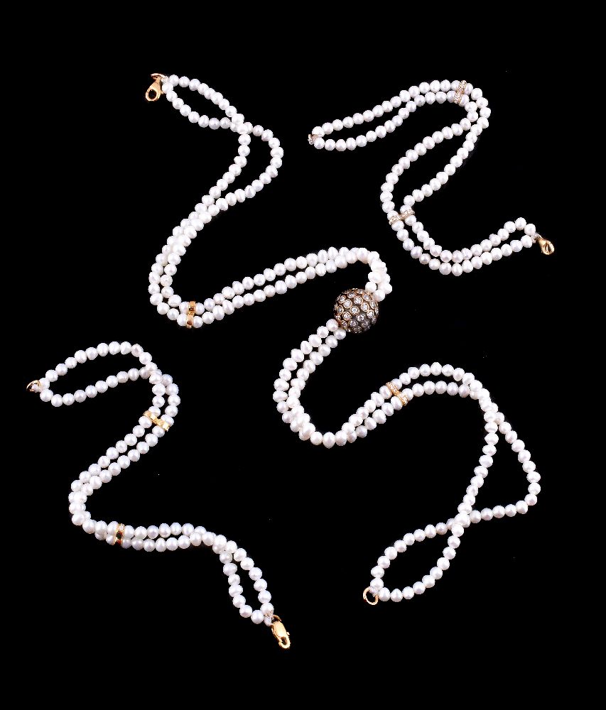 A freshwater cultured pearl and diamond necklace and bracelets