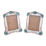 A matched pair of Art Nouveau silver photograph frames, by Synyer & Beddoes, Birmingham 1904