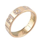 A diamond ring, the band set with brilliant cut diamonds, spelling out 'Simonetta', finger size O,