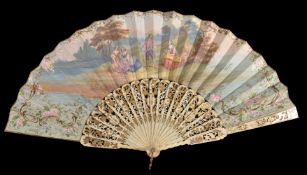 A bone fan, 19th century, the guards pierced with gilt backing and highlights, the sticks similar,