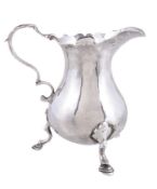 A late George II silver baluster cream jug by Walter Brind, London 1759