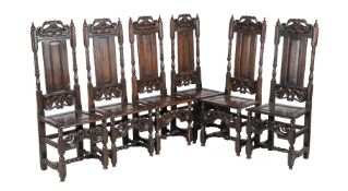 A set of six carved and stained oak high back chairs in 17th century taste, early 20th century