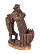 A Spanish carved and stained softwood model of a grape harvester, late 19th century
