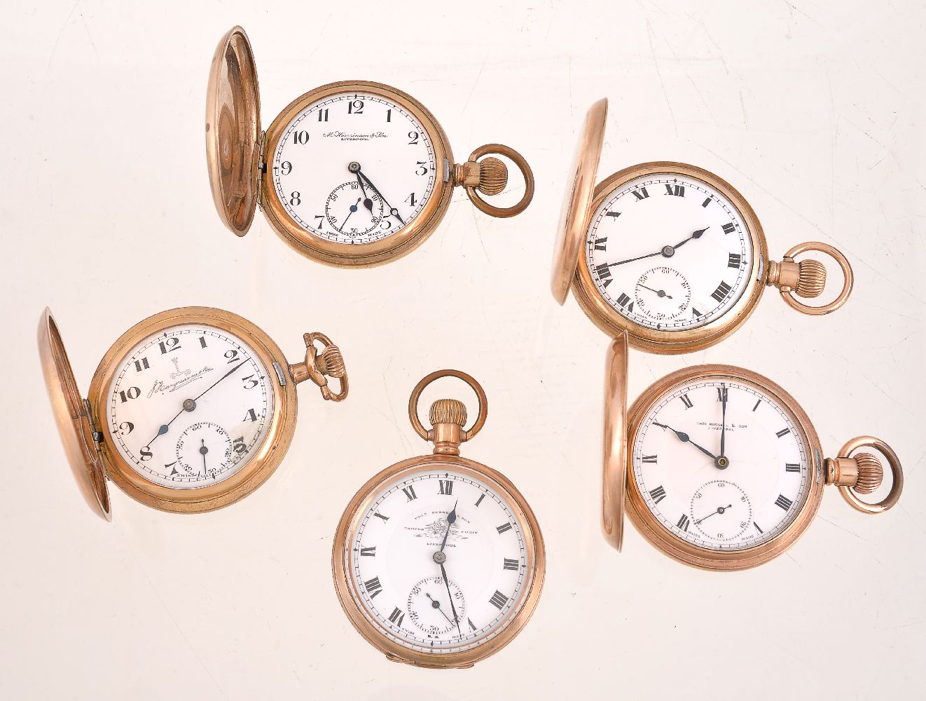 A collection of four gold pated full hunter keyless wind pocket watches
