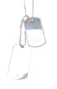 A silver coloured dog tag necklace by Gucci