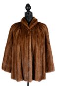 A brown mink fur cape coat