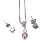 A diamond and pink sapphire pendant