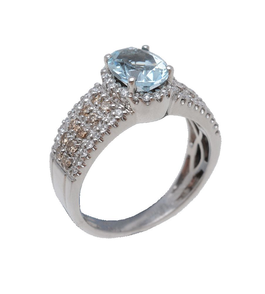 A blue topaz and diamond ring