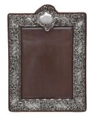 A late Victorian silver photograph frame by Henry Matthews
