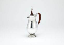 ϒ Georg Jensen, a Danish silver baluster chocolate pot or pitcher