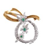 A 1970s 18 carat gold emerald and diamond floral hoop brooch